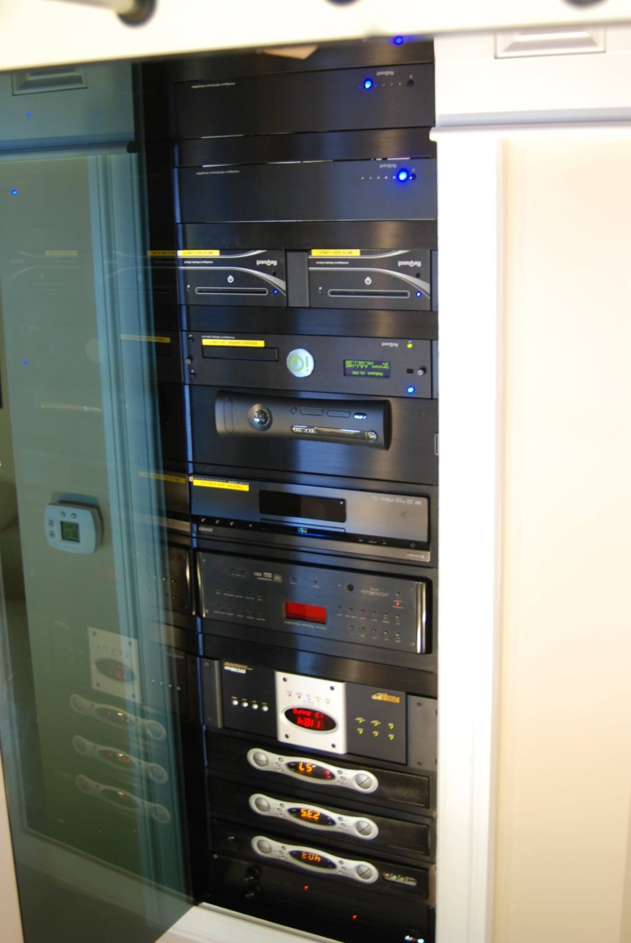 Custom Kaleidescape media rack with organized components