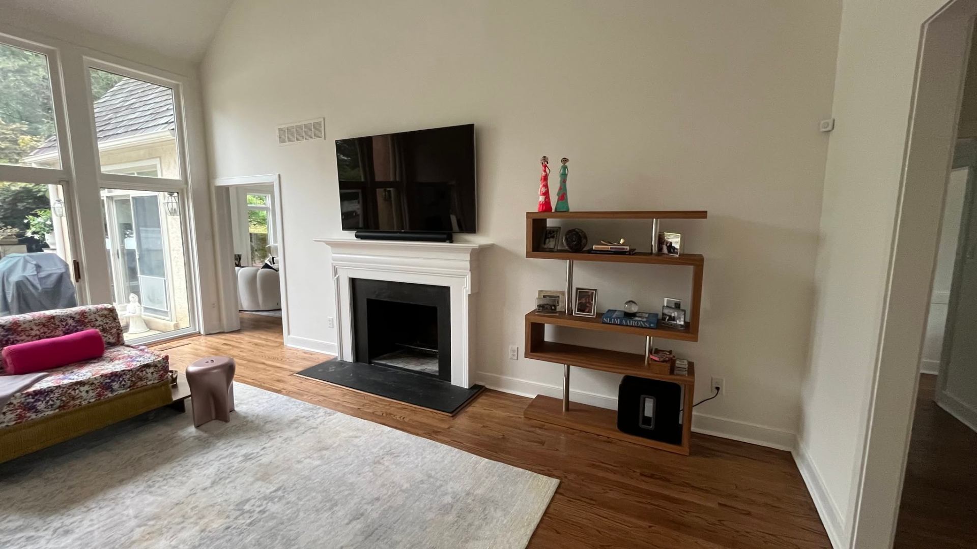 TV mounted above fireplace with clean concealed wiring